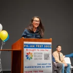 Mary Peltola smiles while giving a speech at Ketchikan’s 2022 Fil-Am Fest. (Eric Stone/KRBD)